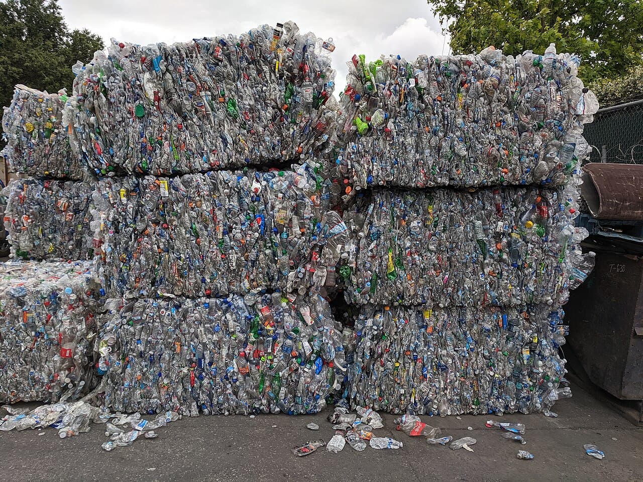 Stacked bales of sorted PET bottles ready for recycling